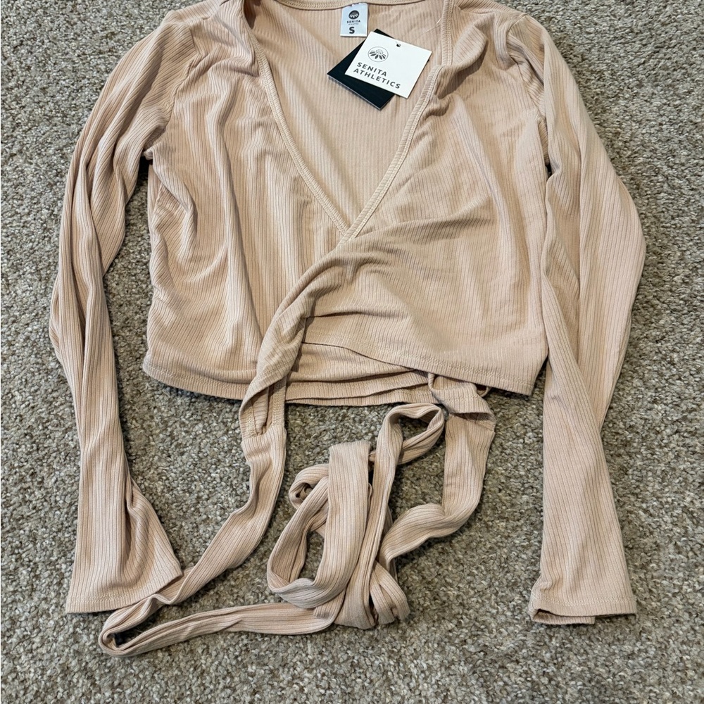 Senita Athletics Ribbed Wrap Long Sleeve Top in Beige